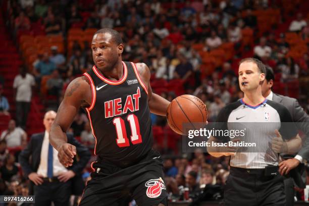 Dion Waiters of the Miami Heat handles the ball against the Dallas Mavericks on December 22, 2017 at American Airlines Arena in Miami, Florida. NOTE...