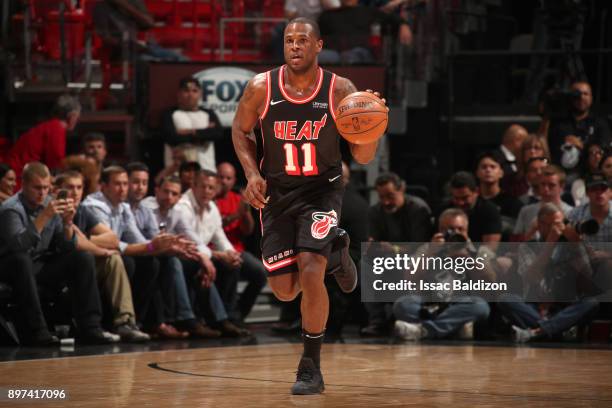 Dion Waiters of the Miami Heat handles the ball against the Dallas Mavericks on December 22, 2017 at American Airlines Arena in Miami, Florida. NOTE...