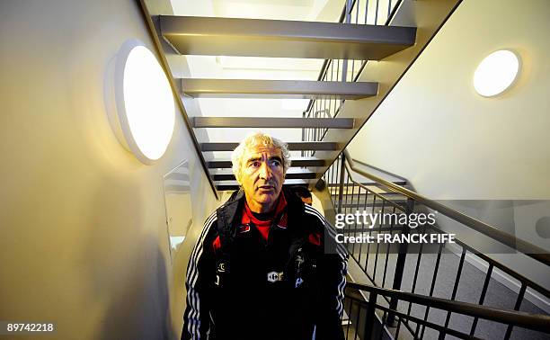 France's national football team coach Raymond Domenech arrives for a press conference at the Torsvollur stadium in Torshavn in the Faroe Islands on...