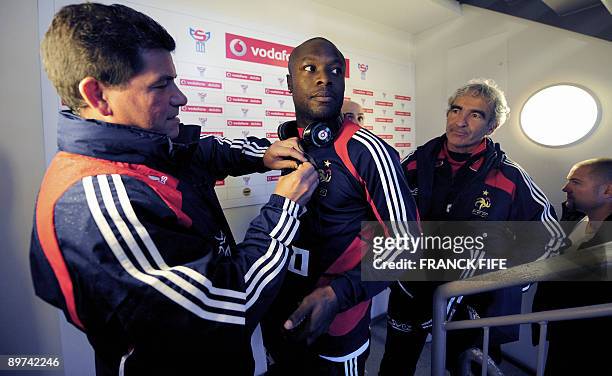 France national football team's captain William Gallas and coach Raymond Domenech arrive to attend a press conference, on August 11, 2008 at the...
