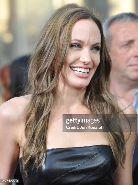 Actress Angelina Jolie arrives at the Los Angeles Premiere "Inglourious Basterds" at Grauman's Chinese Theatre on August 10, 2009 in Hollywood,...