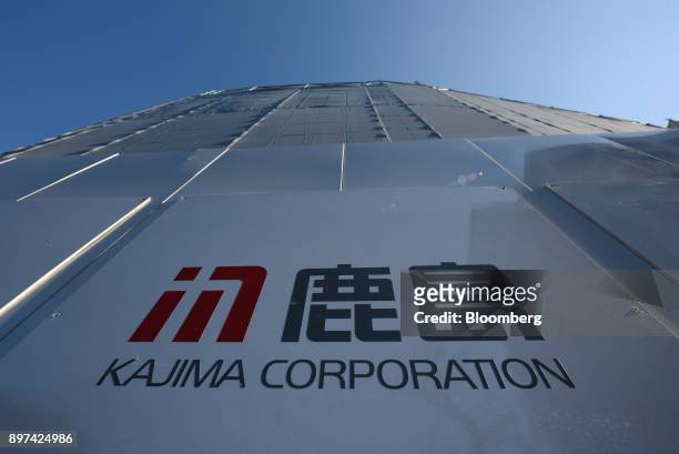 Logo of Kajima Corp. Is displayed on a fence at a construction site in Tokyo, Japan, on Friday, Dec. 22, 2017. Japan's major construction companies,...
