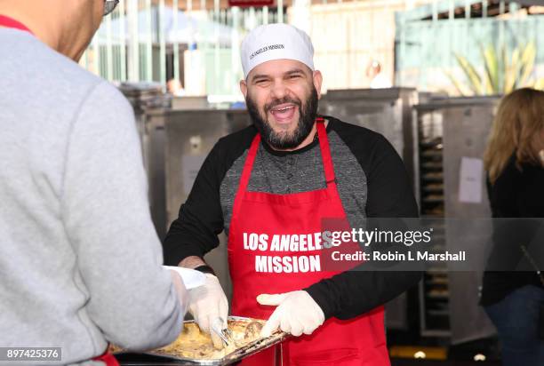 Actor Guillermo Diaz "ABC Scandal" attends Christmas Celebration on Skid Row at Los Angeles Mission on December 22, 2017 in Los Angeles, California.