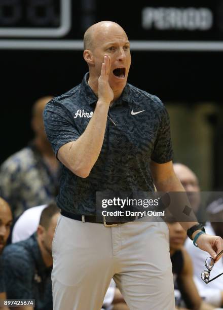 Head coach John Groce of the Akron Zips shouts out to his players during the first half of the game against the USC Trojans at the Stan Sheriff...