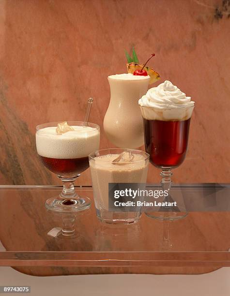 variety of dessert drinks - 4 cocktails stockfoto's en -beelden