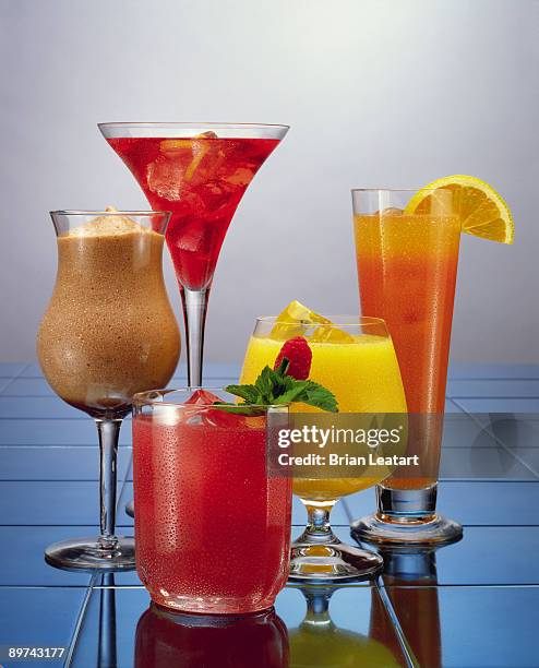 assorted mixed drinks - screwdriver drink stock pictures, royalty-free photos & images