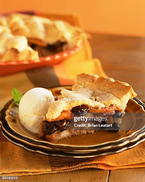 slice of apple cherry pie - apple pie a la mode stock pictures, royalty-free photos & images