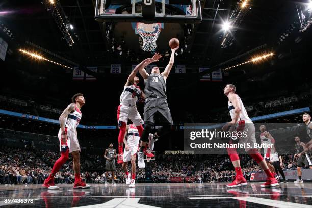 Timofey Mozgov of the Brooklyn Nets shoots the ball against the Washington Wizards on December 22, 2017 at Barclays Center in Brooklyn, New York....