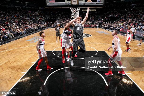 Timofey Mozgov of the Brooklyn Nets shoots the ball against the Washington Wizards on December 22, 2017 at Barclays Center in Brooklyn, New York....