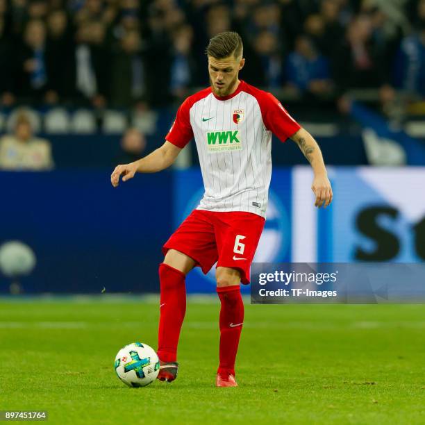 Jeffrey Gouweleeuw of Augsburg controls the ball during the Bundesliga match between FC Schalke 04 and FC Augsburg at Veltins-Arena on December 13,...