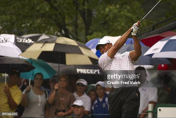 Bridgestone Invitational: Tiger Woods in action, drive from tee on No 18 during Saturday play at Firestone CC. Rain, weather. Akron, OH 8/8/2009...