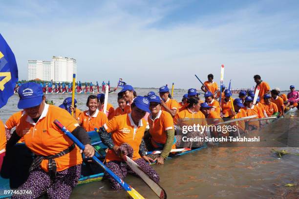 Cambodian dragon boat women crew members take part in the Water Festival boat race on the Tonle Sap river. The country's annual three-day Water...