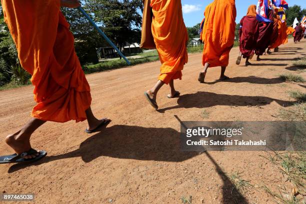 Activist monks who are marching to in front of the National Assembly to participate in the International Human Rights Day rallies to call for an end...