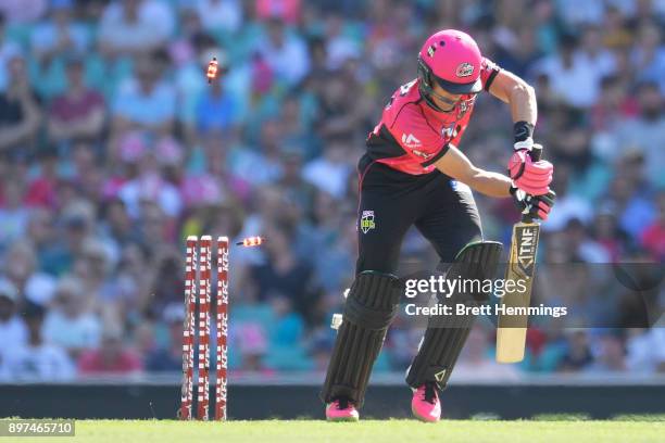 Johan Botha of the Sixers is bowled out by David Willey of the Scorchers during the Big Bash League match between the Sydney Sixers and the Perth...