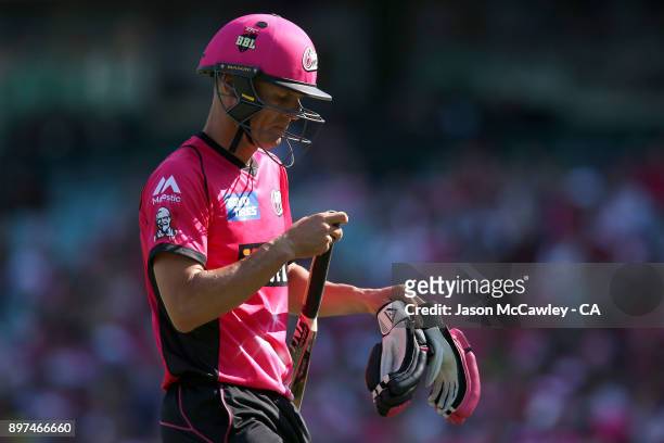 Johan Botha looks dejected after been dismissed by David Willey of the Scorchers during the Big Bash League match between the Sydney Sixers and the...
