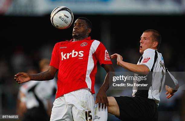 Izale Mcleod of Charlton holds off the ball from Ryan Valentine during the Carling Cup 1st round game between Hereford United and Charlton Athletic...