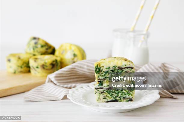 sliced frittata egg muffin - frittata stock pictures, royalty-free photos & images