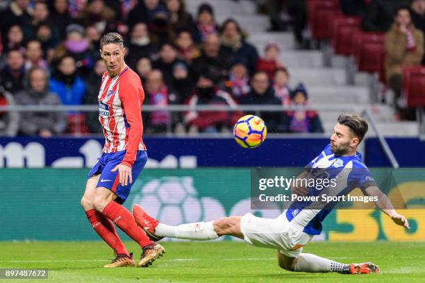 Fernando Torres of Atletico de Madrid attempts a kick while being defended by Ruben Duarte of Deportivo Alaves during the La Liga 2017-18 match...