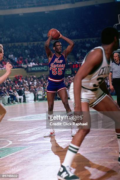 Albert King of the New Jersey Nets passes against the Boston Celtics during a game played in 1982 at the Boston Garden in Boston, Massachusetts. NOTE...