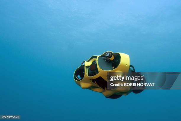 Picture taken on December 21, 2017 shows the first submarine autonomous drone called "iBubble" during a diving to run some tests in the Mediterranean...