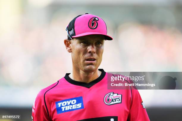 Johan Botha of the Sixers looks on during the Big Bash League match between the Sydney Sixers and the Perth Scorcher at Sydney Cricket Ground on...