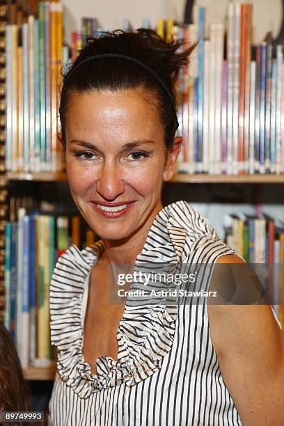 Fashion designer Cynthia Rowley teaches sewing to children at The New York Public Library August 11, 2009 in New York City.