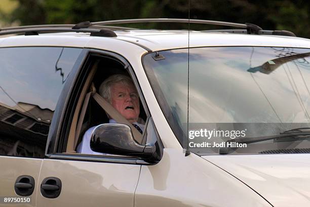 Sen. Edward Kennedy arrives by car at the home of his sister, Eunice Kennedy Shriver to attend her wake August 11, 2009 in Hyannisport,...