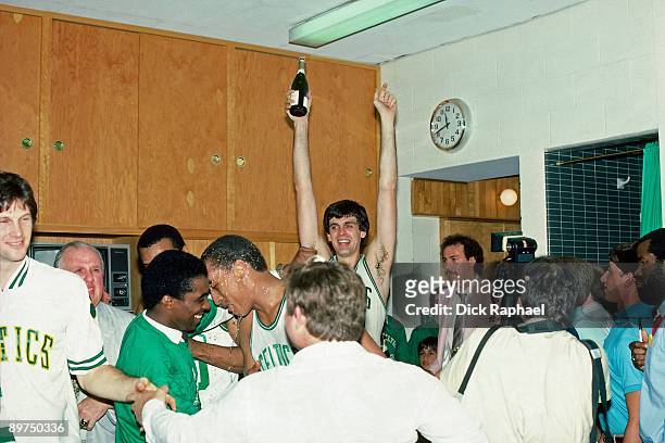Kevin McHale and his the Boston Celtic teammates celebrate their championship win over the Los Angeles Lakers in Game Seven of the 1984 NBA Finals on...