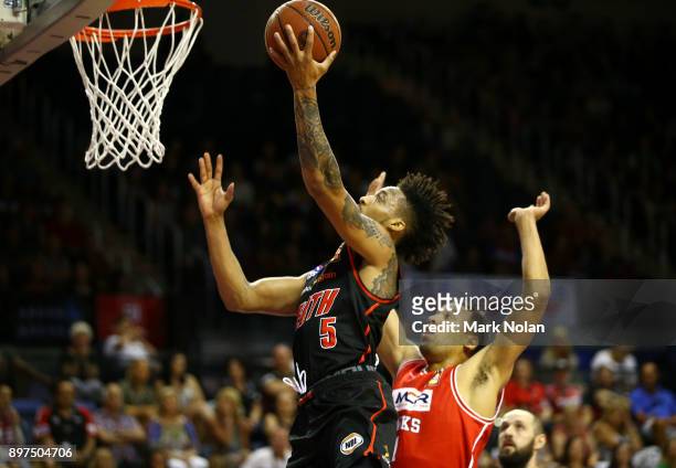 Jean-Pierre Tokoto of the Wildcats drives to the basket during the round 11 NBL match between the Illawarra Hawks and the Perth Wildcats at...