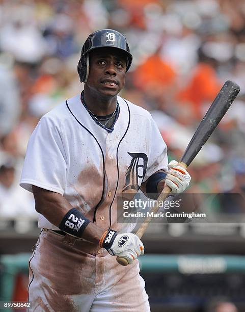 Curtis Granderson of the Detroit Tigers looks on against the Minnesota Twins during the game at Comerica Park on August 9, 2009 in Detroit, Michigan....