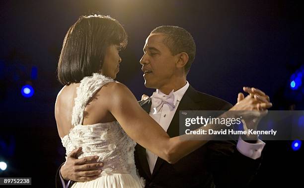 First lady Michelle Obama and President Barack Obama dance at one of ten inaugural galas on January 20, 2009 in Washington, DC. Barack Obama was...