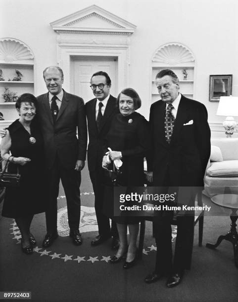 Alan Greenspan's mother Rose Goldsmith, President Gerald R. Ford, Alan Greenspan, writer Ayn Rand, and her husband Charles Francis "Frank" O'Connor,...