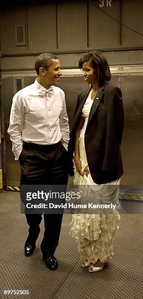 President Barack Obama and First Lady Michelle Obama stand in a freight elevator prior to their grand entrance for the Neighborhood Inaugural Ball,...