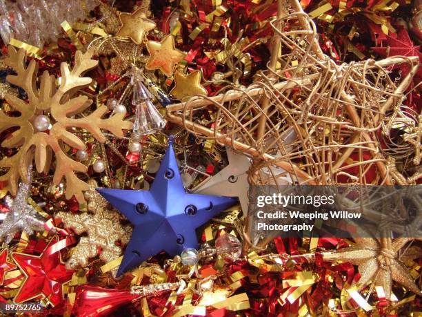 christmas stars and tinsel - poinsettia stock pictures, royalty-free photos & images