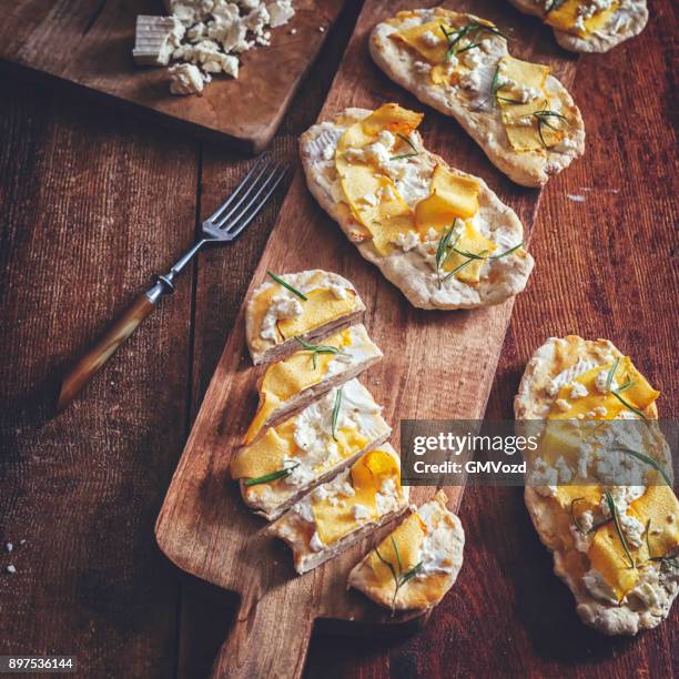 crispbread with serrano ham, cottage cheese, and figs - knäckebrot stock pictures, royalty-free photos & images