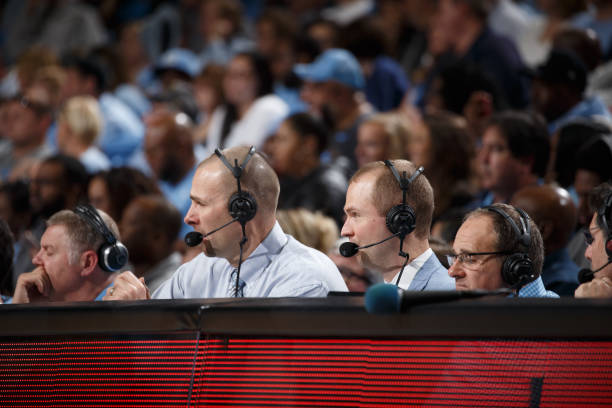Eric Montross and Jones Angell , radio color analyst and play-by-play announcers respectively for the North Carolina Tar Heels, during a North...