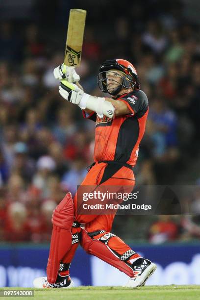 Brad Hodge of the Renegades bats during the Big Bash League match between the Melbourne Renegades and the Brisbane Heat at Etihad Stadium on December...