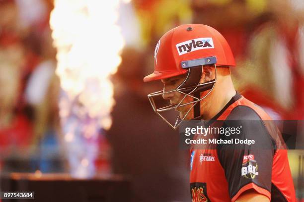 Aaron Finch of the Renegades focuses during the Big Bash League match between the Melbourne Renegades and the Brisbane Heat at Etihad Stadium on...