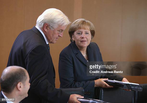 German Chancellor Angela Merkel and German Vice-Chancellor and Foreign Minister Frank-Walter Steinmeier arrive for the weekly German government...