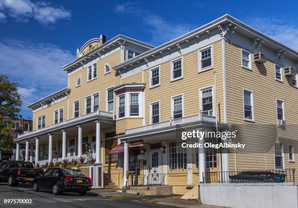 historic hotel st. george (currently office building) and blue sky, nyack, rockland county, hudson valley, new york. - st george stock pictures, royalty-free photos & images