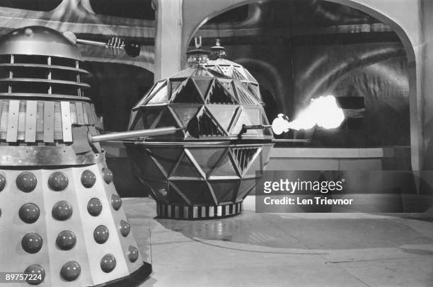 Dalek and a Mechonoid battle it out in 'The Chase', a six-part serial from the popular British television sci-fi series 'Doctor Who', 15th April 1965.