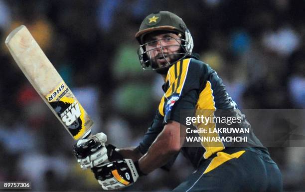 Pakistani cricketer Shahid Afridi plays a shot during a Twenty20 match between Sri Lanka and Pakistan at The R. Premadasa Stadium in Colombo on...