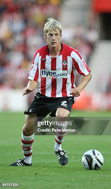 Dan Harding of Southampton runs with the ball during the Carling Cup Round One Match between Southampton and Northampton Town at St Mary's Stadium on...