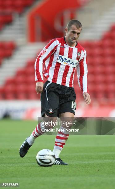 Paul Wotton of Southampton runs with the ball during the Carling Cup Round One Match between Southampton and Northampton Town at St Mary's Stadium on...