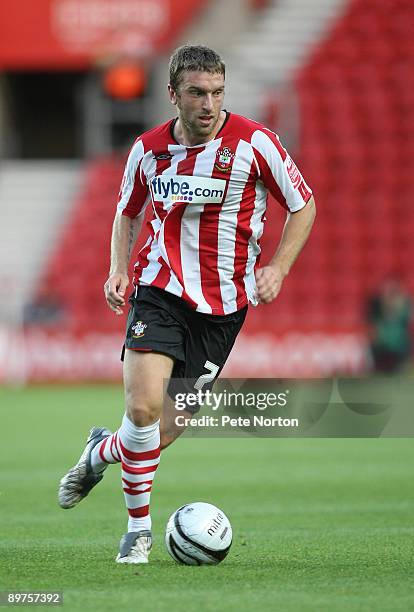 Rickie Lambert of Southampton runs with the ball during the Carling Cup Round One Match between Southampton and Northampton Town at St Mary's Stadium...