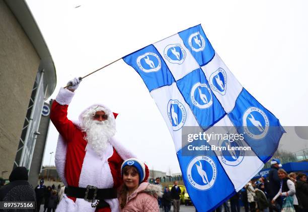 Santa is seen outside the stadium prior to the Premier League match between Brighton and Hove Albion and Watford at Amex Stadium on December 23, 2017...