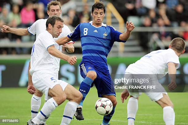 French midfielder Yoann Gourcuff vies with Faroe's defender Egil Bo during the World Cup 2010 qualifying football match France vs. Faroe Islands, on...