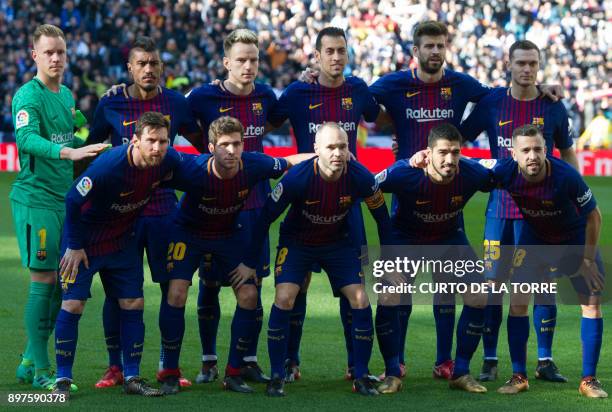 Barcelona's German goalkeeper Marc-Andre Ter Stegen, Barcelona's Brazilian midfielder Paulinho, Barcelona's Croatian midfielder Ivan Rakitic,...