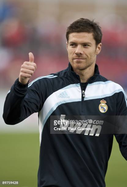 Midfielder Xabi Alonso of Real Madrid warms up on the pitch before the friendly match against the Toronto FC at BMO Field on August 7, 2009 in...