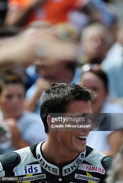 James Toseland of Britain and Monster Yamaha Tech 3 smiles during the MotoGP pre-event in Wiener Ringstrasse in Wien on August 12, 2009 in Vienna,...